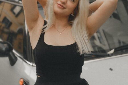 Portrait of Blonde Woman Wearing Black Dress